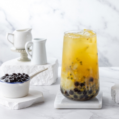 Orange Passionfruit Green Tea with Boba and Coconut Jelly.jpg